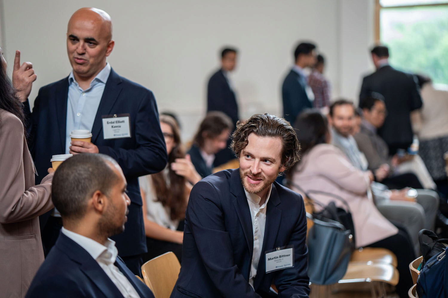 People networking at a conference