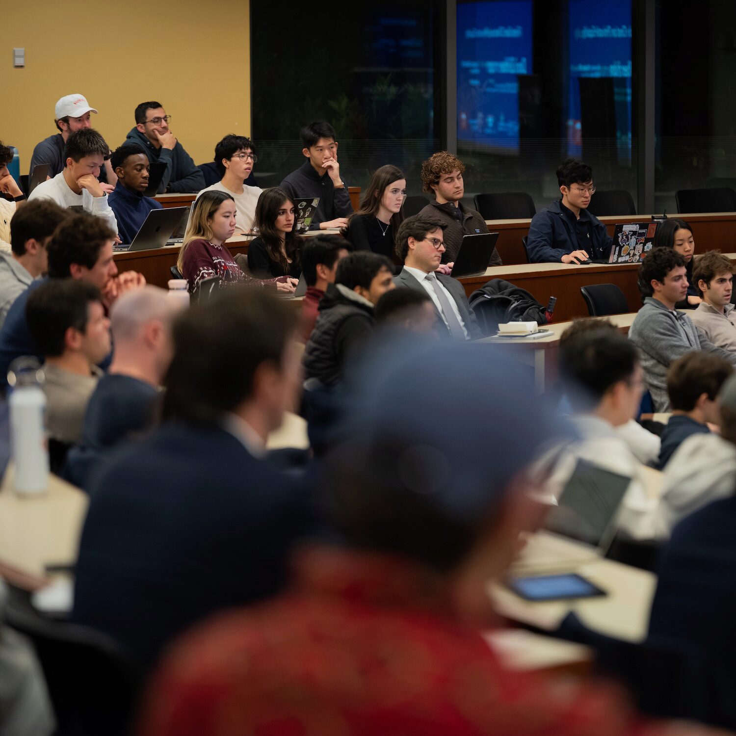 A full classroom faces the viewer's right